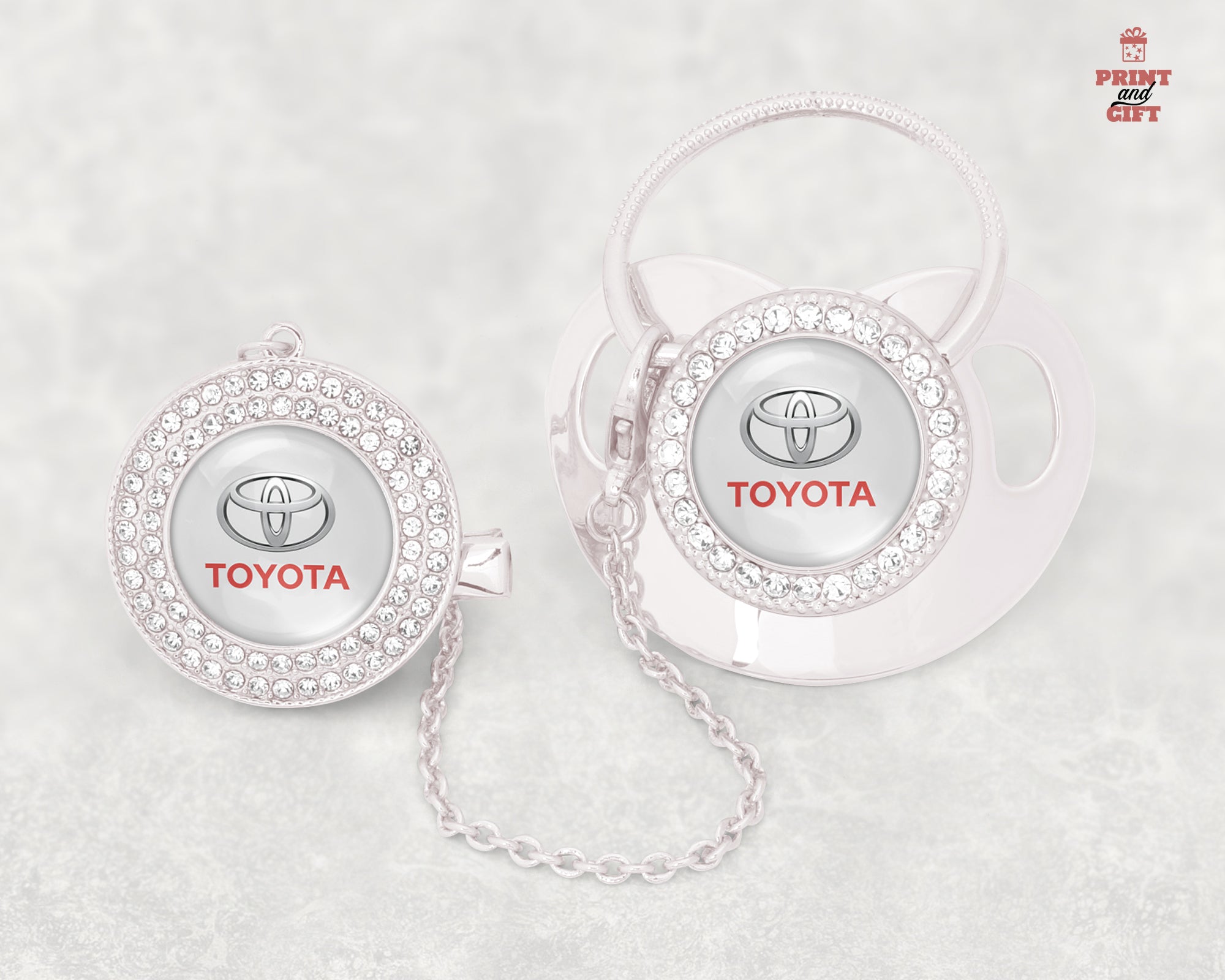 Βρεφική πιπίλα ασημί με σήμα toyota